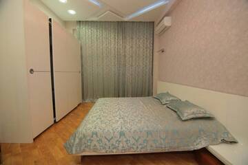 Фото номера Апартаменты с 3 спальнями Апартаменты UZEIR GADGIBEKOVA 25 Street BULVAR г. Баку 55