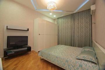 Фото номера Апартаменты с 3 спальнями Апартаменты UZEIR GADGIBEKOVA 25 Street BULVAR г. Баку 9