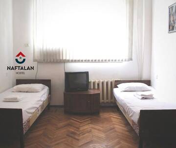Фото номера Стандартный двухместный номер с 2 отдельными кроватями Отель Naftalan Guest House г. Баку 18