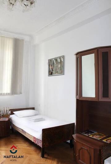 Фото номера Кровать в общем 4-местном номере для мужчин и женщин Отель Naftalan Guest House г. Баку 5