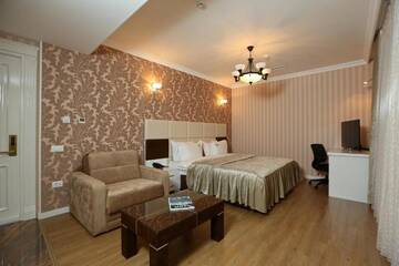 Фото номера Двухместный номер Делюкс с 1 кроватью Отель Old Street Boutique Hotel г. Баку 10