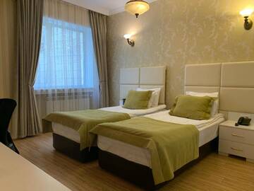 Фото номера Двухместный номер с 2 отдельными кроватями Отель Old Street Boutique Hotel г. Баку 5