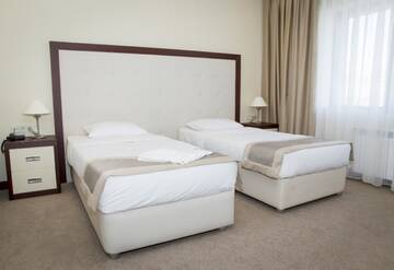 Фото номера Стандартный двухместный номер с 2 отдельными кроватями Отель Black Mount Hotel г. Баку 3