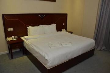 Фото номера Двухместный номер с 1 кроватью или 2 отдельными кроватями Отель Astoria Hotel г. Баку 2