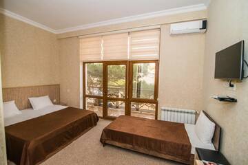 Фото номера Стандартный трехместный номер Отель AEF-Butik Hotel г. Баку 5