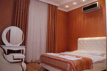 Фото номера Двухместный номер с кроватью размера &quot;king-size&quot; Мини-отель Baku Butik Mini-Hotel г. Баку 9