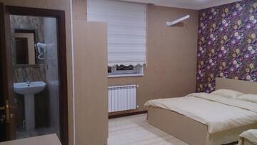 Фото номера Трехместный номер с собственной ванной комнатой Мини-отель Baku Butik Mini-Hotel г. Баку 3