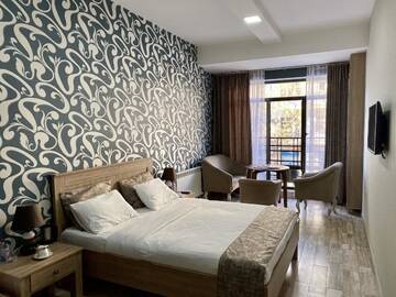 Фото номера Стандартный семейный номер Отель Nizami Street Hotel г. Баку 2
