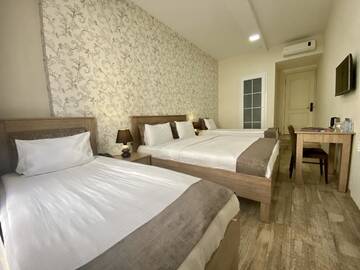 Фото номера Четырехместный номер Отель Nizami Street Hotel г. Баку 2