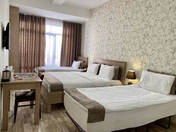 Фото номера Четырехместный номер Отель Nizami Street Hotel г. Баку 3