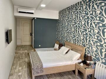 Фото номера Стандартный семейный номер Отель Nizami Street Hotel г. Баку 3