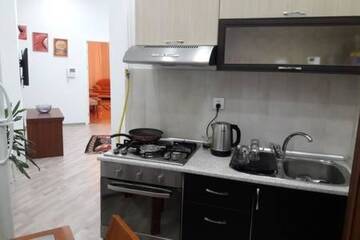 Фото номера Апартаменты с 1 спальней Апартаменты NIZAMI Street 2 г. Баку 38