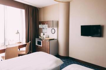 Фото номера Двухместный номер Делюкс с 2 отдельными кроватями Отель Staybridge Suites Baku г. Баку 4
