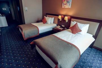 Фото номера Двухместный номер Делюкс с 2 отдельными кроватями Отель Staybridge Suites Baku г. Баку 7