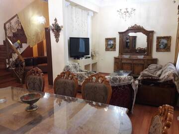 Фото номера Апартаменты с 3 спальнями Апартаменты 28 MAJ Street NEFT AKADEMIA г. Баку 25