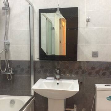 Фото номера Апартаменты Делюкс Апартаменты Azneft Square Apartment г. Баку 21