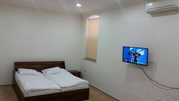 Фото номера Четырехместный номер с общей ванной комнатой Хостелы Baku Home Hostel г. Баку 3