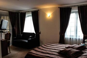 Фото номера Двухместный номер Делюкс с 1 кроватью и балконом Отель Deniz Inn Boutique Hotel г. Баку 41