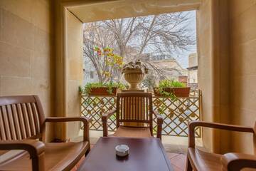 Фото номера Двухместный номер Делюкс с 1 кроватью и балконом Отель Deniz Inn Boutique Hotel г. Баку 7