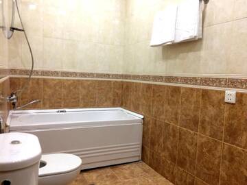 Фото номера Апартаменты с 3 спальнями Апартаменты 28 Center Apartment г. Баку 17