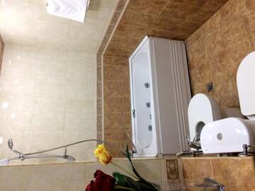 Фото номера Апартаменты с 3 спальнями Апартаменты 28 Center Apartment г. Баку 87