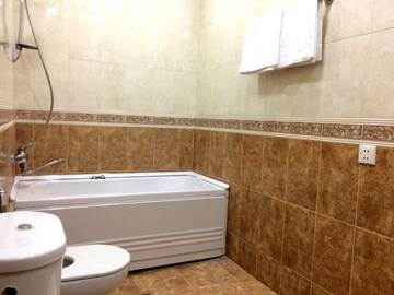 Фото номера Апартаменты с 3 спальнями Апартаменты 28 Center Apartment г. Баку 65