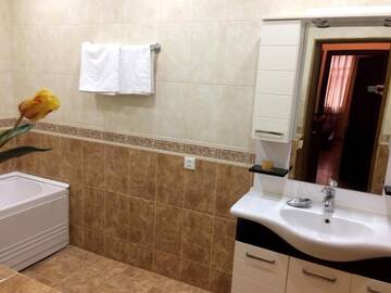 Фото номера Апартаменты с 3 спальнями Апартаменты 28 Center Apartment г. Баку 64