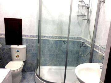 Фото номера Апартаменты с 3 спальнями Апартаменты 28 Center Apartment г. Баку 32