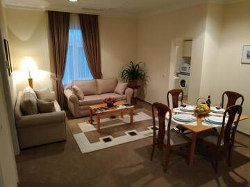 Фото номера Апартаменты с 2 спальнями Апарт-отели City Mansion ApartHotel г. Баку 3