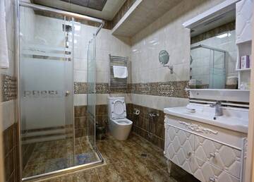 Фото номера Улучшенный семейный номер Отель Rusel Hotel г. Баку 8