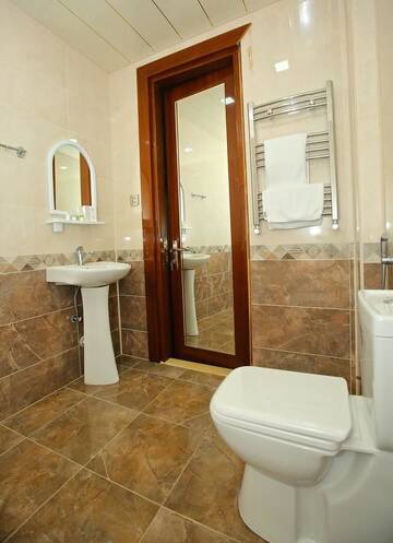 Фото номера Апартаменты с 2 спальнями Отель Rusel Hotel г. Баку 7
