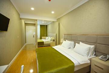 Фото номера Бюджетный двухместный номер с 1 кроватью Отель Rusel Hotel г. Баку 3