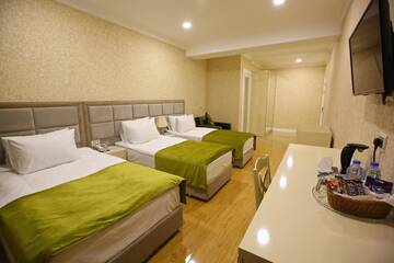 Фото номера Трехместный номер эконом-класса Отель Rusel Hotel г. Баку 4