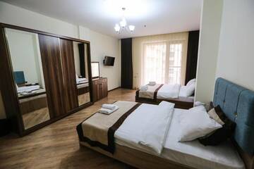 Фото номера Апартаменты с 2 спальнями Отель Greencity Resort&amp;Residence г. Баку 3