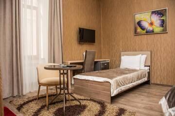 Фото номера Двухместный номер Делюкс с 1 кроватью Отель Seven Boutique Hotel Baku г. Баку 7