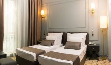Фото номера Двухместный номер с 2 отдельными кроватями Отель Teatro Rooms Hotel г. Баку 6