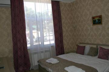 Фото номера Стандартный номер с кроватью размера &quot;queen-size&quot; Гостевой дом Damla Guest House г. Баку 21