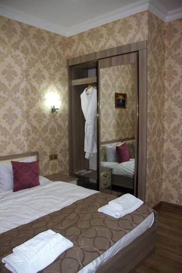 Фото номера Стандартный номер с кроватью размера &quot;queen-size&quot; Гостевой дом Damla Guest House г. Баку 22