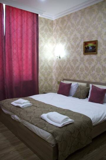 Фото номера Стандартный номер с кроватью размера &quot;queen-size&quot; Гостевой дом Damla Guest House г. Баку 10