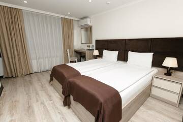 Фото номера Бюджетный двухместный номер с 2 отдельными кроватями Отель Deluxe City Hotel г. Баку 4