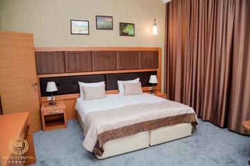 Фото номера Двухместный номер Делюкс с 1 кроватью и душем Отель GM City Hotel г. Баку 7