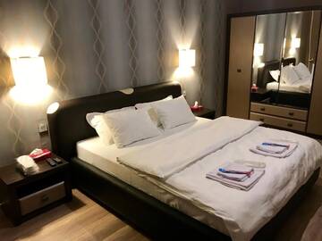 Фото номера Апартаменты с 2 спальнями Апартаменты SHAH INN Panoramic Apartments City Center г. Баку 7