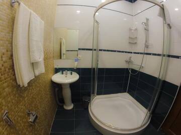 Фото номера Трехместный номер, вид на сад Отель Marsel Hotel г. Баку 11