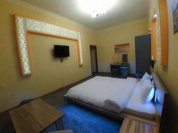Фото номера Трехместный номер, вид на сад Отель Marsel Hotel г. Баку 5