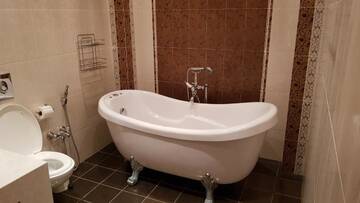 Фото номера Апартаменты с 3 спальнями Апартаменты Deluxe City Center Apartment г. Баку 57
