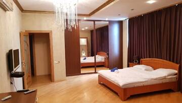 Фото номера Апартаменты с 3 спальнями Апартаменты Deluxe City Center Apartment г. Баку 11