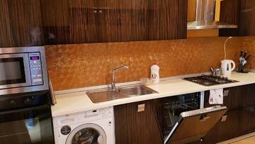 Фото номера Апартаменты с 3 спальнями Апартаменты Deluxe City Center Apartment г. Баку 30