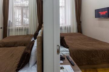 Фото номера Семейный люкс Отель Deniz Inn City Hotel г. Баку 4