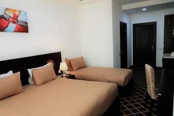 Фото номера Трехместный номер «Комфорт» Отель Kristal Hotel г. Баку 3