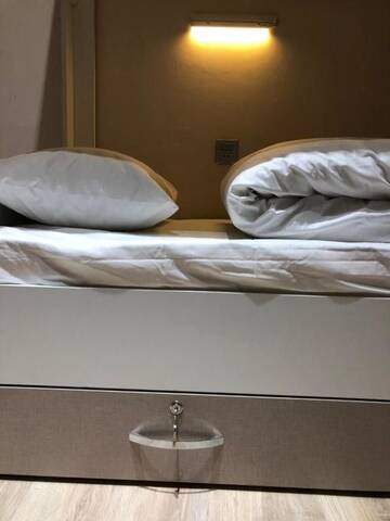 Фото номера Спальное место на двухъярусной кровати в общем номере для мужчин и женщин Хостелы Travel Inn Hostel г. Баку 9
